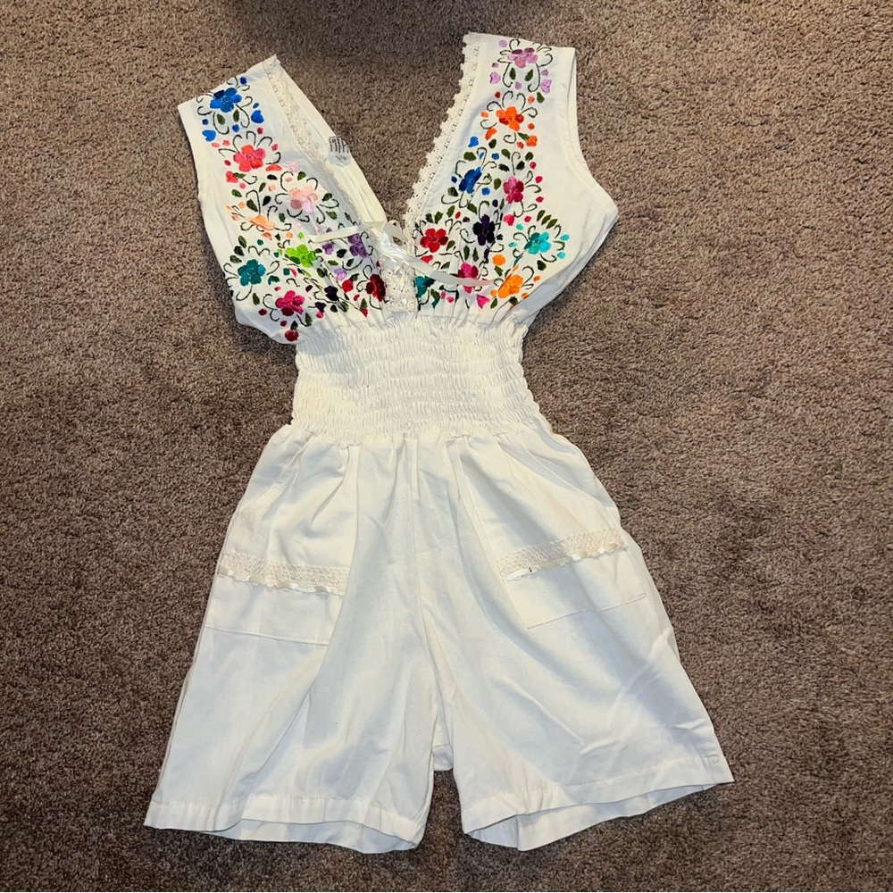 White Sleeveless Romper with Floral Embroidery and Cut-Out Sides